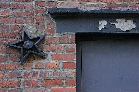 metal star on house meaning urban dictionary|metal stars on old buildings.